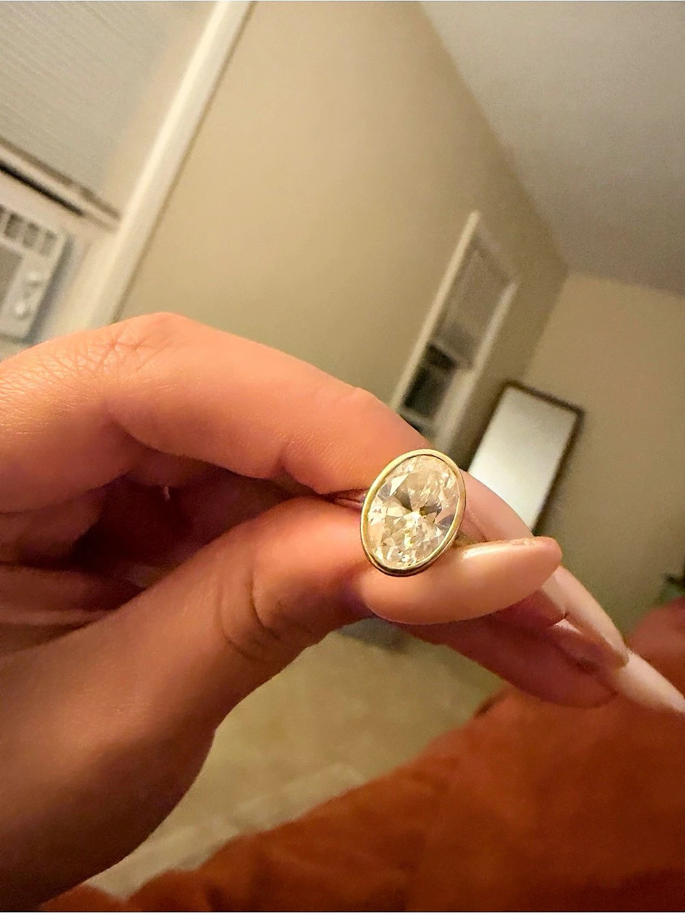 Oval bezel 10k lab grown diamond